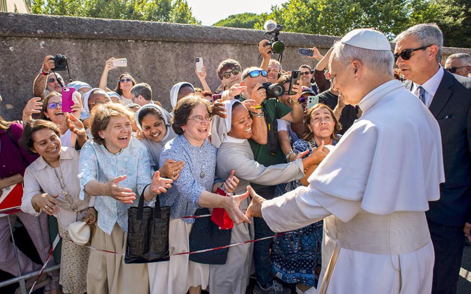 Pope Leo XIV greets people as he arrives in Castel Gandolfo, Italy, July 6, 2025, after reciting the Angelus at the Vatican. (CNS/Vatican Media)