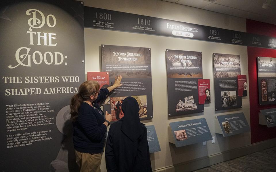 Visitors view "Do the Good: The Sisters Who Shaped America" at the National Shrine of St. Elizabeth Ann Seton on opening day, March 19. (Courtesy of the National Shrine of St. Elizabeth Ann Seton)