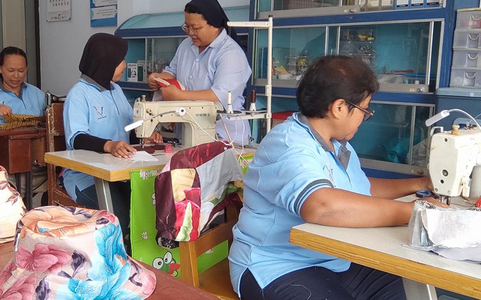 Sr. Cicilia Indrayani of the Daughters of Charity teaches women how to sew and prepares them for the garment industry in the region. (Courtesy of the Daughters of Charity)