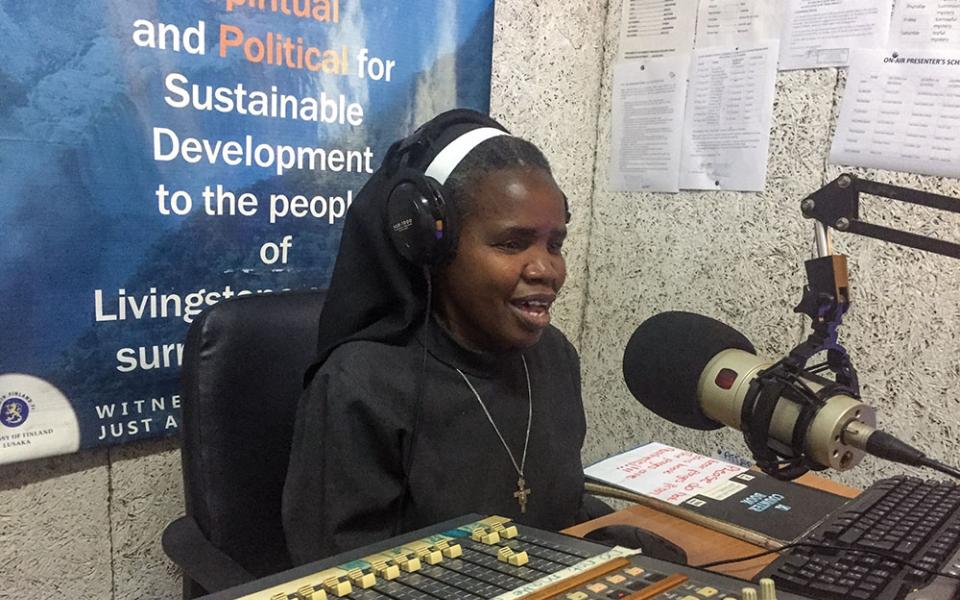 Sr. Perpetua Namasiku Mutonga, a member of the Little Sisters of St. Francis and the founder of Tumelo Catholic Media, evangelizes and shares messages of faith at Livingstone's Radio Musi-O-Tunya. (Derrick Silimina)
