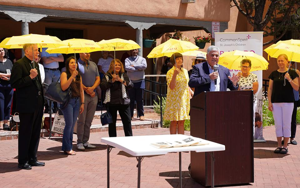 Allen Sánchez, president of the nonprofit CommonSpirit St. Joseph's Children, speaks about the sainthood cause of Sr. Blandina Segale of the Sisters of Charity, June 1 in Santa Fe, New Mexico, in front of a convent named for Segale. (Courtesy of the Sisters of Charity of Cincinnati)
