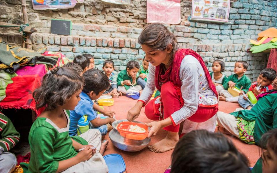 Children are served their school meal at a school in India in this 2017 photograph. (OSV News/Courtesy Mary's Meals)