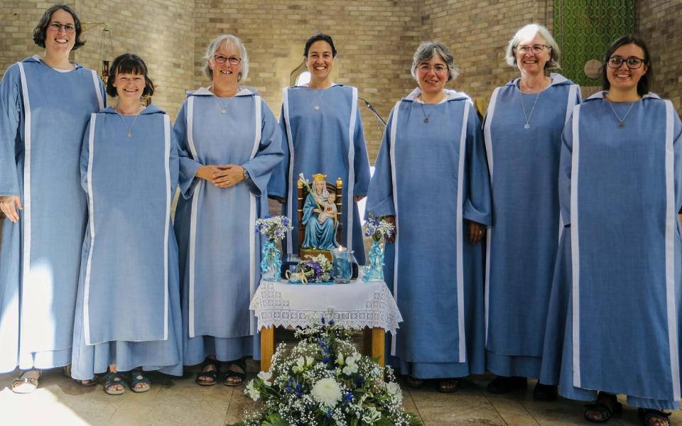 Sisters of the Community of Our Lady of Walsingham pose for a photo at Mary's House in Walsingham, England. (Courtesy of Community of Our Lady of Walsingham)