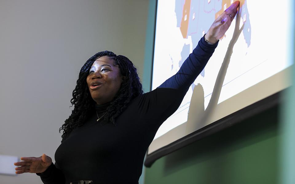 Shannen Dee Williams, associate professor of history at the University of Dayton, speaks to her students during a class April 21 in Dayton, Ohio. (AP photo/Aaron Doster)