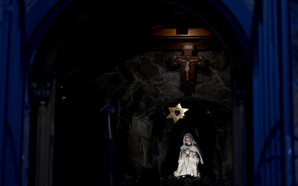 A statue of the "Virgen del Cerro," formally called La Inmaculada Madre Del Divino Corazón Eucarístico De Jesús, sits at her sanctuary May 2 in Salta, Argentina. (AP/Natacha Pisarenko)