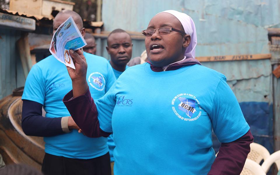 Sr. Virginia Njeri of the Religious of the Assumption talks to residents of Kawangware, a low-income residential area in Nairobi, July 22. The sisters conduct peace campaigns to urge residents to maintain peace and avert violence during elections. (GSR)