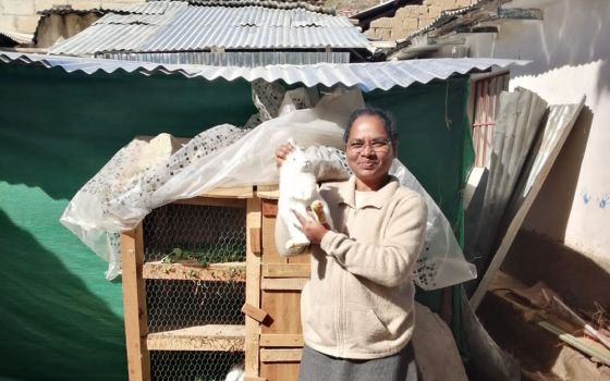 Franciscan Missionary of Mary Sr. Hilda Mary Bernath with her rabbit project in Curahuasi, Peru (Courtesy of Hilda Mary Bernath)