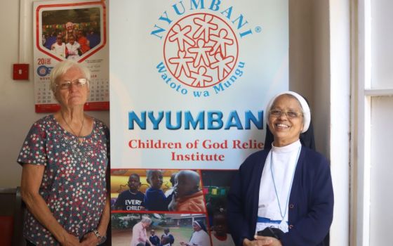 Sr. Tresa Palakudy of the Sisters of the Adoration of the Blessed Sacrament, right, poses with Sr. Julia Mulvihill of the Sisters of St. Francis of Philadelphia at Nyumbani Children's Home for orphans living with HIV/AIDS. (Wycliff Oundo)