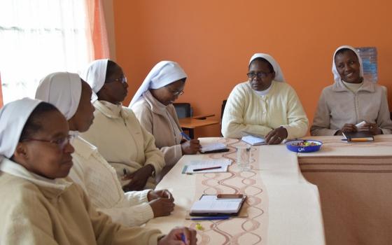 Missionary Sisters of the Holy Family talk about their experiences as part of their 2019 canonical visitation meeting in Nairobi, Kenya. (Courtesy of Lilian Atieno)