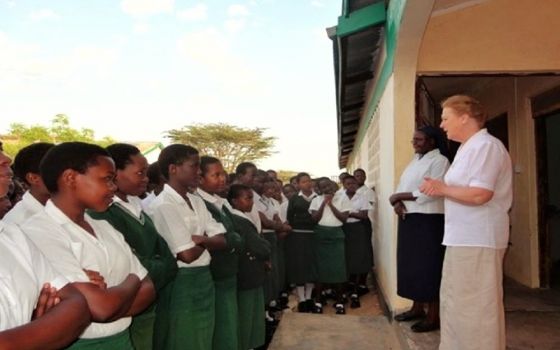 Sr. Mary McHugh, who spent most of her ministry in Kenya, addresses students in 2011 at Turkana Girls Secondary School, Lodwar. It was the first secondary school for girls in the Turkana Desert. Also pictured is Sr. Florence Nabwire, principal. 