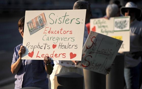 Laity and religious hold a rally in support of nuns gathered for the August 2012 assembly of the Leadership Conference of Women Religious in St. Louis. Earlier that year, the Vatican's Congregation for the Doctrine of the Faith had ordered reform of the o