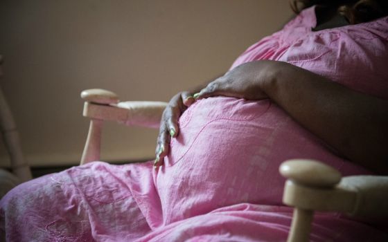 An expectant mother is seen in 2016 at a maternity home in Riverside, New Jersey, one of six pro-life maternity homes in the Good Counsel network. (CNS/Jeffrey Bruno)