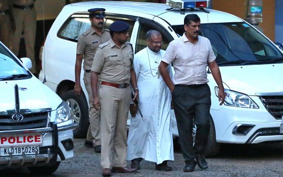 Bishop Franco Mulakkal of Jalandhar, India, is led away for questioning by police Sept. 19, 2018, on the outskirts of Cochin. (CNS/Reuters/Sivaram V)