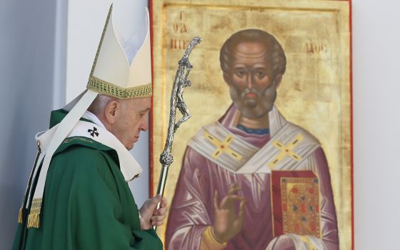 Pope Francis passes an image of St. Nicholas after celebrating Mass in Bari, Italy, Feb. 23, 2020. (CNS photo/Paul Haring) 