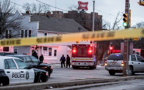 Police investigate a shooting at the Molson Coors headquarters in Milwaukee Feb. 26. (CNS/Reuters/Sara Stathas) 