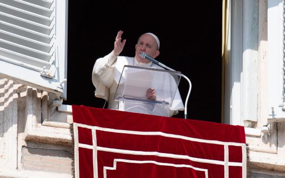 Pope Francis leads the Angelus from the window of his studio overlooking St. Peter's Square at the Vatican Feb. 21, 2021. (CNS photo/Vatican Media)