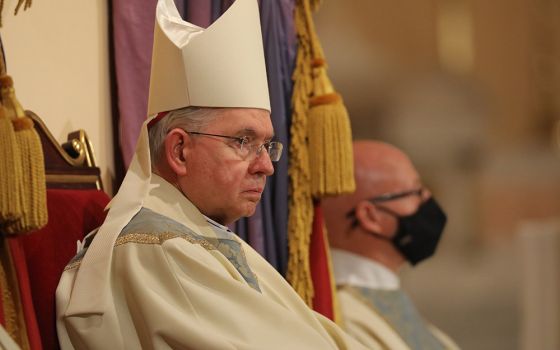 Los Angeles Archbishop José Gomez sits in the cathedra, or bishop's chair, as he concelebrates Mass at the Basilica of the National Shrine of the Assumption of the Blessed Virgin Mary Nov. 15 in Baltimore during the bishops' fall general assembly. (CNS)