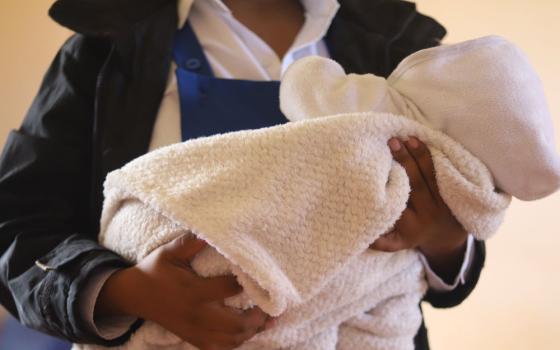 Woman holding baby