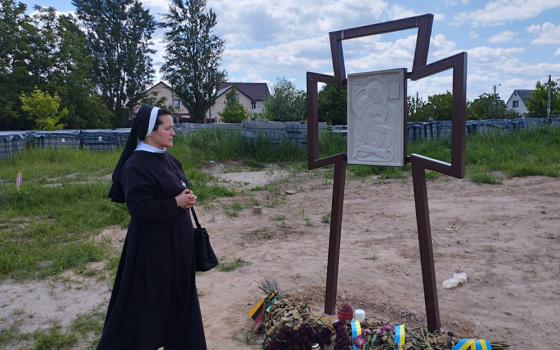 Basilian Sr. Januarija Isyk prays in Bucha, Ukraine. (Courtesy of Sisters of the Order of Saint Basil the Great)