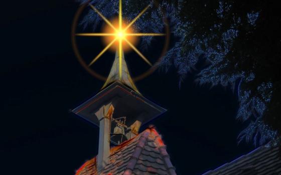 Church tower with Christmas star above