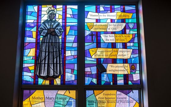 An image of Mother Mary Lange, foundress of the Oblate Sisters of Providence, in a stained-glass window in the chapel of the religious order's motherhouse near Baltimore (CNS/Chaz Muth)