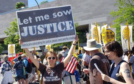Members of Catholic groups take part in the Moral March on Washington on June 18 sponsored by the Poor People's Campaign. The Catholic contingent was organized by Network, a Catholic social justice lobby; the Leadership Conference of Women; the Sisters of