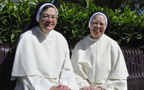 Sr. Elizabeth Anne Allen and Sr. Jean Marie Warner of the Congregation of Dominican Sisters of St. Cecilia in Nashville, Tennessee, share a joyful moment Sept. 12 as they celebrate their golden jubilee, which officially occurred July 8, and 50 years of fr