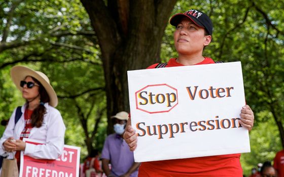 People attend a June 26, 2021, rally in Washington calling for a stop to voter suppression. (CNS/Reuters/Elizabeth Frantz)