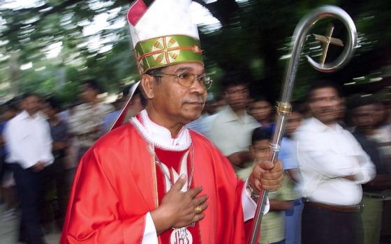 East Timorese Bishop Carlos Filipe Ximenes Belo arrives for an outdoor Mass in Dili May 19, 2002, the day before East Timor officially became an independent nation. (CNS photo/Darren Whiteside, Reuters)