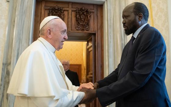 Pope Francis shakes hands with South Sudanese President Salva Kiir during a private audience March 16, 2019, at the Vatican. The pope will visit South Sudan Feb. 3-5, on a trip that will also take him to Congo. (OSV News/Vatican Media)