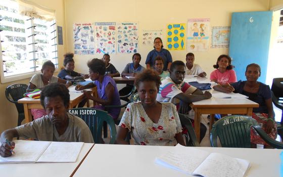 Sr. Maria Fe Rollo, standing in back, with her numerancy and literacy class in March 2018 at San Isidro Care Centre (Courtesy of Maria Fe Rollo)