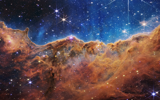 NASA's James Webb Space Telescope captured this image July 12, 2022, showing what NASA describes as "the edge of a nearby, young, star-forming region called NGC 3324 in the Carina Nebula." (Flickr/ NASA's James Webb Space Telescope, CC BY 2.0)