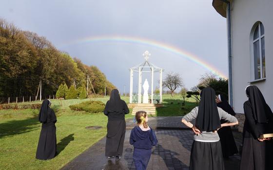 On April 25, 2022, the first day after Easter, a rainbow appears over the house where the Basilian sisters were sheltering about 30 refugees at the Transfiguration Monastery in Beregy in the Lviv region of Ukraine. (Courtesy of Sisters of the Order of St. Basil the Great)