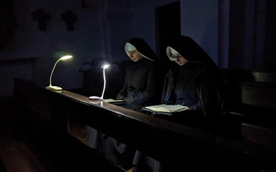 Sisters pray in the chapel of a Benedictine monastery in Ukraine when the lights are turned off. (Courtesy of Scholastica Oleksandra Hulivata)