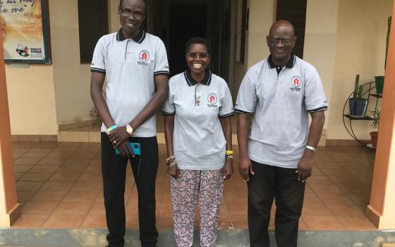 Scholasticah Nganda is pictured with two staff members of the Good Shepherd Peace Centre-Kit, a few miles south of Juba, in South Sudan. Nganda writes about how she and her colleagues try to keep hope alive in a country in turmoil and conflict. (Courtesy of Scholasticah Nganda)