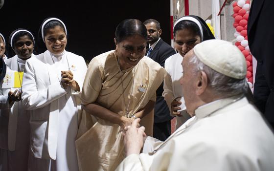 Sr. Maria Nirmalini, the superior general of the Apostolic Carmel congregation and sisters of the Apostolic Carmel congregation, meet with Pope Francis in Bahrain in November 2022. (Vatican Media/Francesco Sforza)