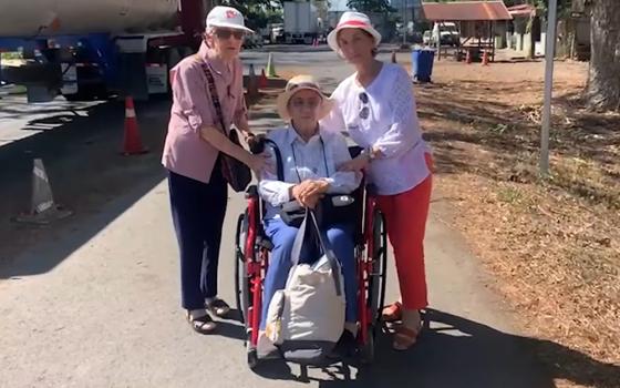 1.	Dominican Sisters of the Anunciata Isabel Blanco, left, and Cecilia Blanco, in the wheelchair, are welcomed April 12 into Costa Rica by their biological sister Violeta Blanco after crossing from Nicaragua, in this video posted on Facebook by the Diocese of Tilarán-Liberia. (GSR screen capture/Facebook)
