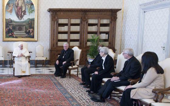 Pope Francis meets with Mercedarian Sr. Shizue "Filo" Hirota from Tokyo, third from right, and other members of the preparatory commission for the general assembly of the Synod of Bishops on March 16 in the library of the Apostolic Palace at the Vatican. Pictured to the right of the pope are: Cardinal Jean-Claude Hollerich of Luxembourg, general relator of the upcoming synod; Bishop Lucio Muandula of Xai-Xai, Mozambique; Hirota; Archbishop Timothy Costelloe of Perth