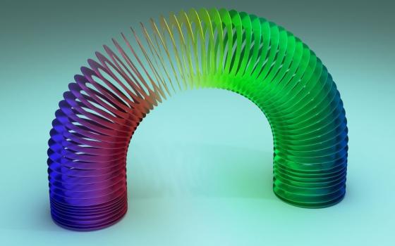 a Slinky is stretched into a half moon shape