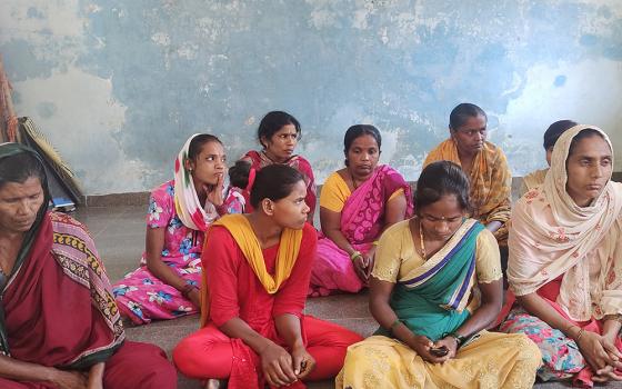 A group of devadasis, who are part of a church-initiated self-help group that Sr. Amala Rani, a member of the Sisters of St. Joseph of Tarbes, coordinates in Bijapur. (Thomas Scaria)