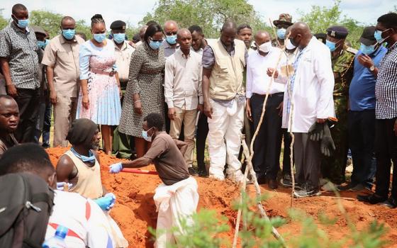 Kenyan authorities continue to retrieve bodies from shallow graves in an 800-acre ranch in Kilifi County near the town of Malindi. All victims were followers of the Good News International Church Pastor Paul Mackenzie. He allegedly told followers to pray and fast to meet Jesus and that the world would end April 15. (OSV News/Courtesy of Sheshi Visual Arts/Moses Mpuria)