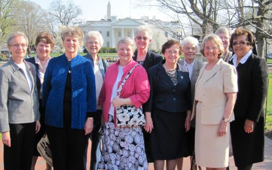 Sisters from almost a dozen congregations gathered in Washington, D.C., in 2013 to advise the Obama administration about human trafficking, an effort that led to the formation of the U.S. Catholic Sisters Against Human Trafficking. Pictured are (from left) Mercy Sr. Jeanne Christensen; Charity Sr. Kathleen Bryant; Sylvania Franciscan Sr. Geraldine Nowak; Sister of the Humility of Mary Sr. Anne Victory; Sisters, Servants of the Immaculate Heart of Mary Sr. Ann Oestreich; Ursuline Sr. Michele Morek; St. Josep