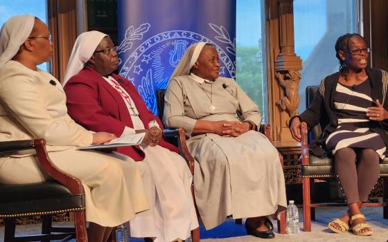 Sr. Josephine Apiagyei, far right, speaks at an April 25 forum at Georgetown University in Washington. The panel also included, from left: Sr. Jane Wakahiu, moderator; Sr. Rosemary Nyirumbe; and Sr. Francisca Ngozi Uti. 