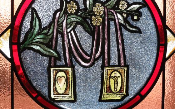 A scapular is depicted in stained glass at St. Brigid of Kildare Church in Dublin, Ohio. (Wikimedia Commons/Nheyob)