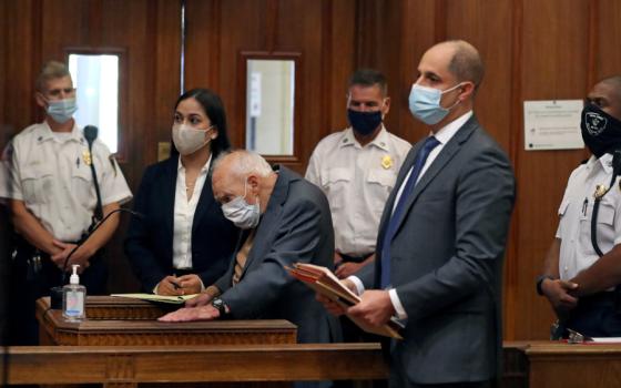 Former Cardinal Theodore E. McCarrick wears a mask during arraignment at Dedham District Court in Dedham, Mass., Sept. 3, 2021, after being charged with molesting a 16-year-old boy during a 1974 wedding reception. A medical expert consulted by Massachusetts prosecutors says McCarrick is not competent to stand trial. (OSV News photo/David L Ryan, Pool via Reuters)
