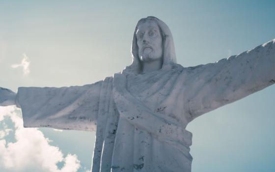 Statue of Jesus with arms wide open