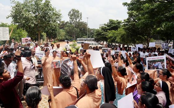 Apostolic Carmel Sr. Maria Nirmalini, who heads the Conference of Religious in India, addresses a June 4 protest rally in Bengaluru to condemn government apathy to women wrestler's demands and to violence in Manipur state. (Courtesy of Sister Clarice Maria)