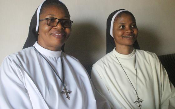 Sr. Justina Nnajiofor, left, and Sr. Chinaza Eze, members of the Dominican Sisters of St. Catherine of Siena, told Global Sisters Report that their faith is unshaken in the face of attacks by bandits in Nigeria. (Patrick Egwu)