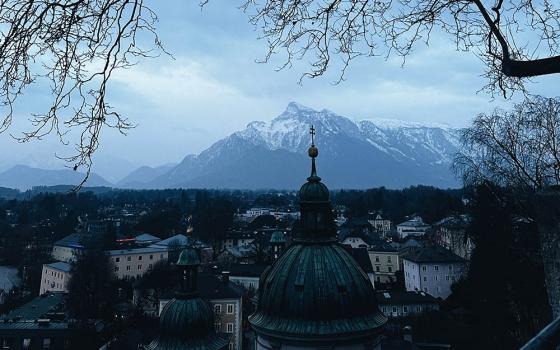 A pre-dawn Austrian sky viewed from the cobbled lane just outside Nonnberg Abbey's walled garden (Sarah Southern)