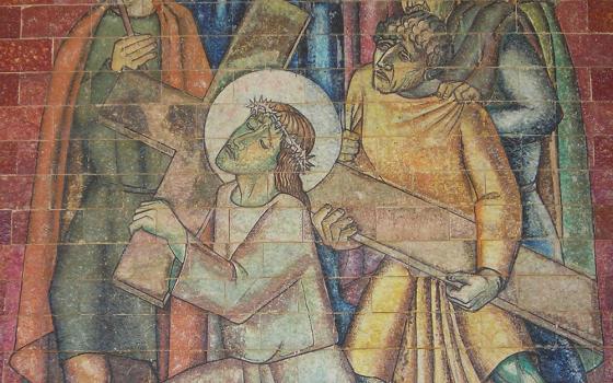 Simon of Cyrene helps Jesus carry the cross in a detail from the Fifth Station of the Cross at the Sanctuary of Our Lady of Fátima in Portugal. (Wikimedia Commons/Therese C)